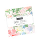 Floral fabric swatch with 'Sweet Cecily' label by Janet Clare on a white background