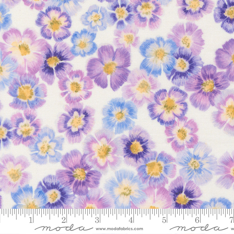 Pattern of purple and blue flowers with yellow centers on a white background with a ruler for scale.