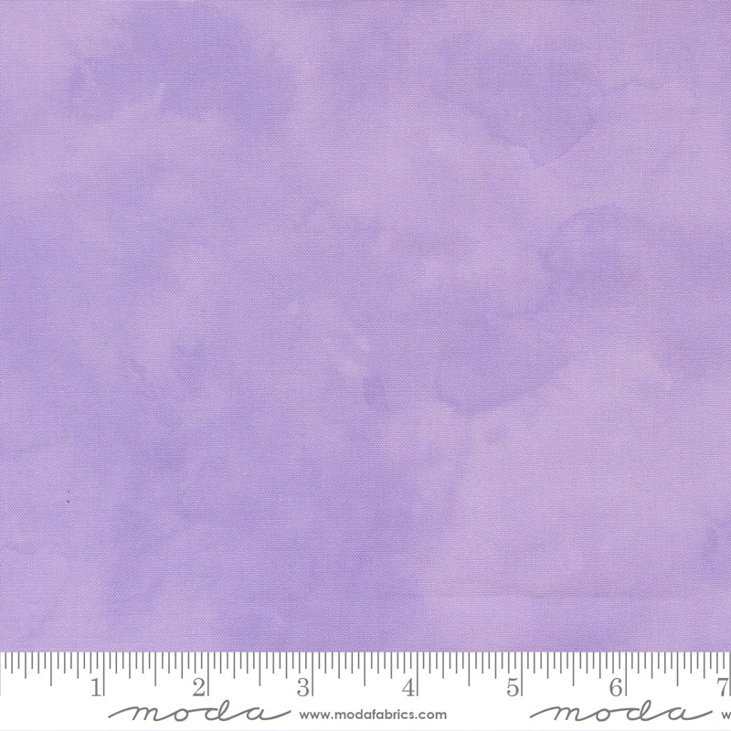 Shaded solid purple fabric swatch with a ruler for scale.
