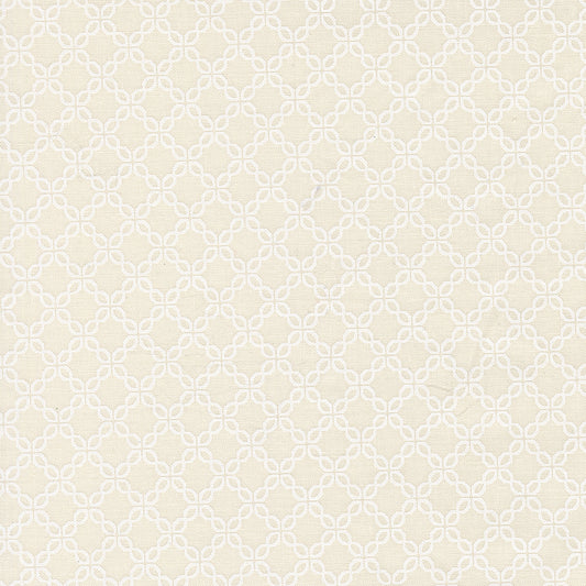 White geometric pattern on a cream background