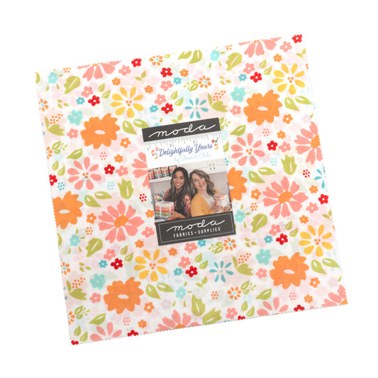 Floral patterned fabric with Moda label on a white background