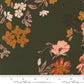 Floral fabric pattern with a ruler at the bottom on a green background