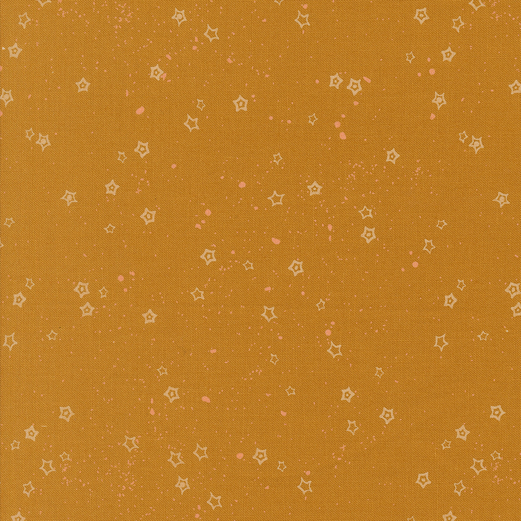 Pattern of small stars on a caramel background