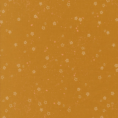 Pattern of small stars on a caramel background