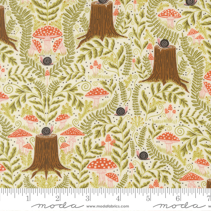 Woodland-themed fabric pattern with trees, mushrooms, and leaves on a cream background, featuring Moda label.