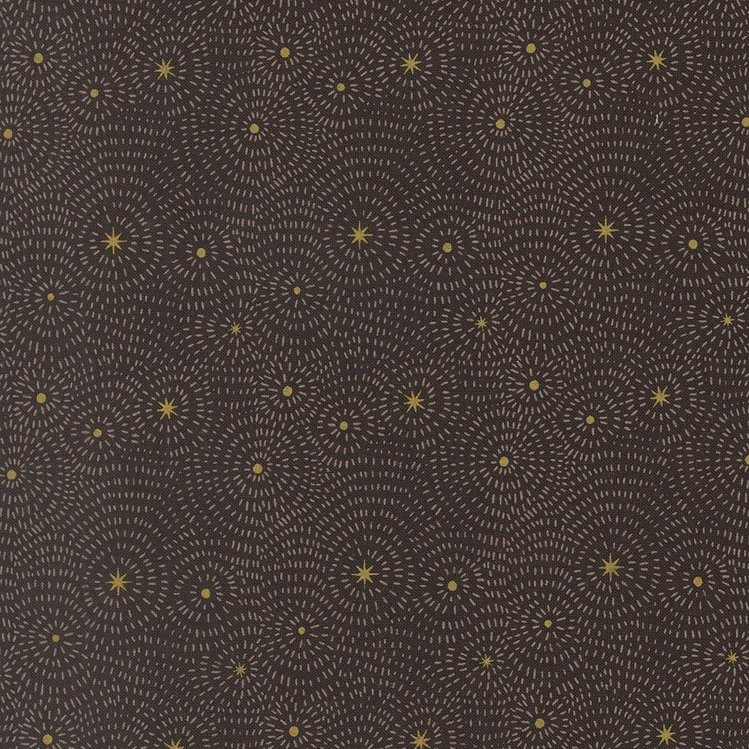 Pattern of concentric circles and stars on a dark background