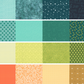 Grid of various 50 Yards of Moda fabric patterns in a green and orange palette.