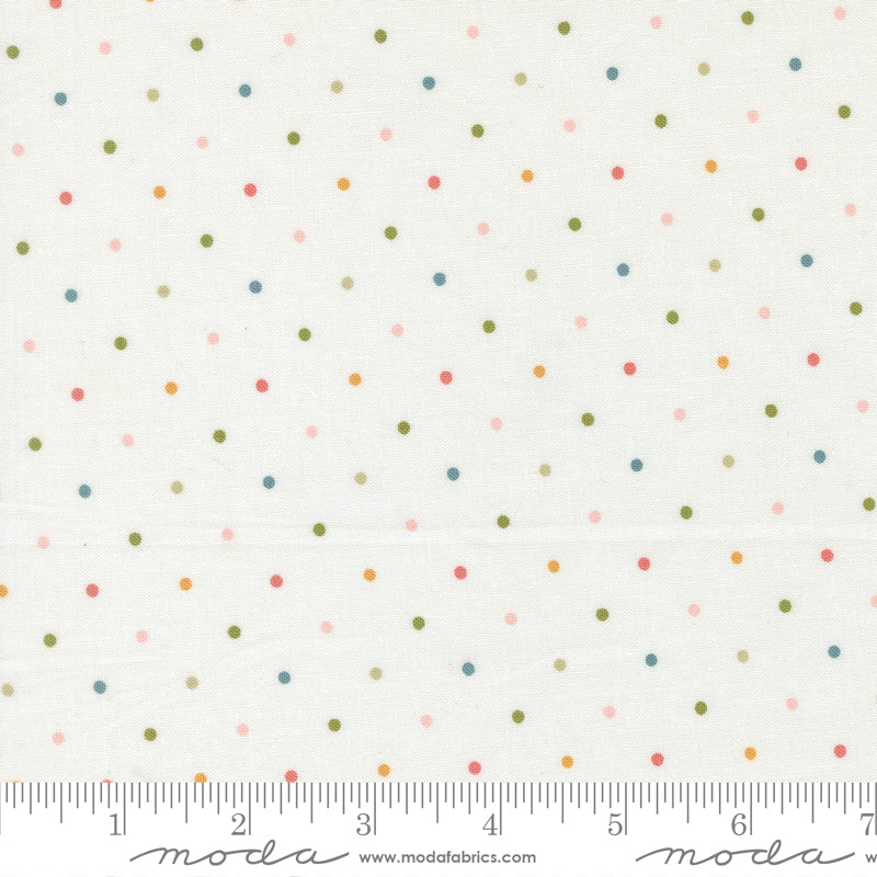 White Fabric with Pin Dots in Pink, Honey, Green, and Blue. 100% Cotton from Wild Honey by Lella Boutique 
for Moda Fabrics. Ruler for Scale at the Bottom.