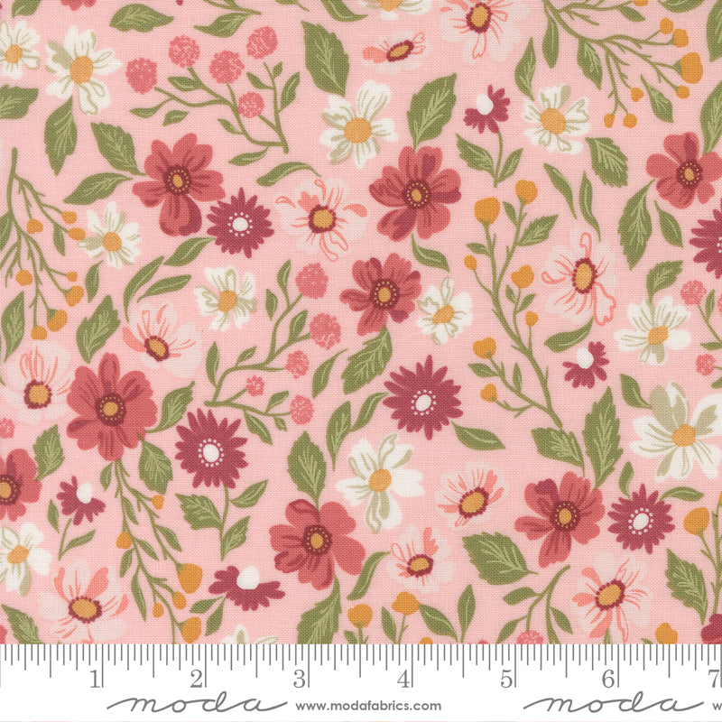 Pink Floral Fabric with Flowers in White and Pink. 100% Cotton from Wild Honey by Lella Boutique for Moda Fabrics. Ruler at the bottom for scale.