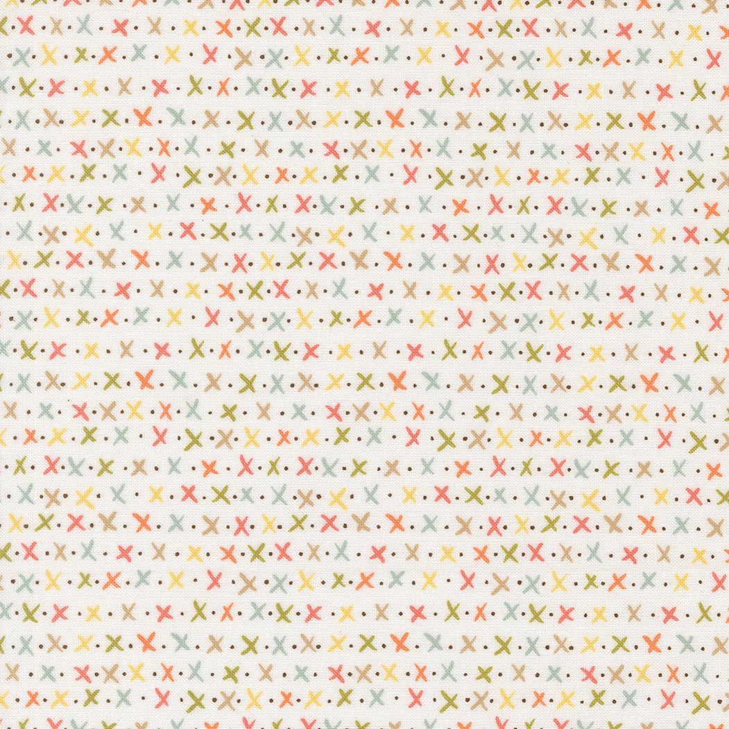 Pattern of small crosses and dots on a light background