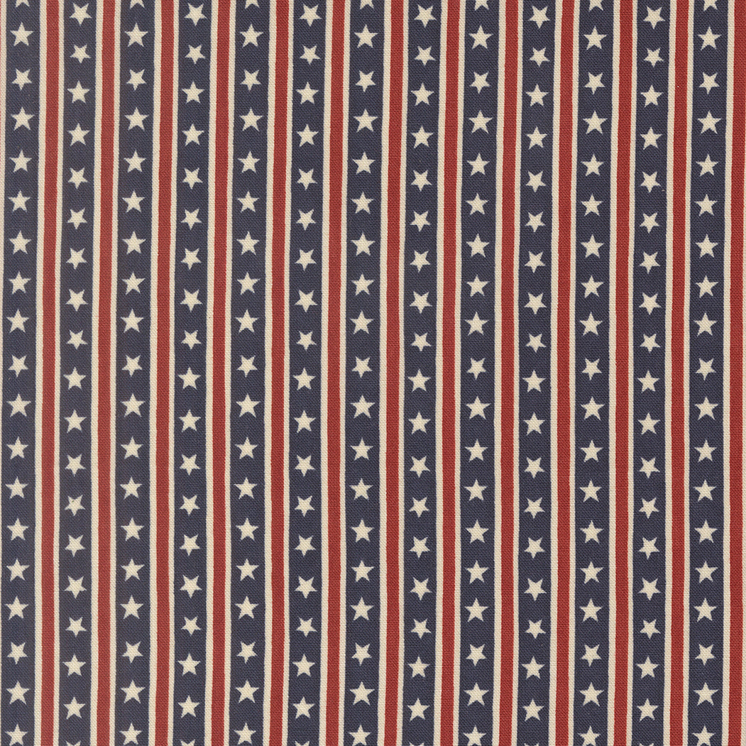 Fabric swatch with a pattern of red, white, and blue stars and stripes.