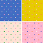Four different patterns of colorful heart shapes on solid backgrounds.
