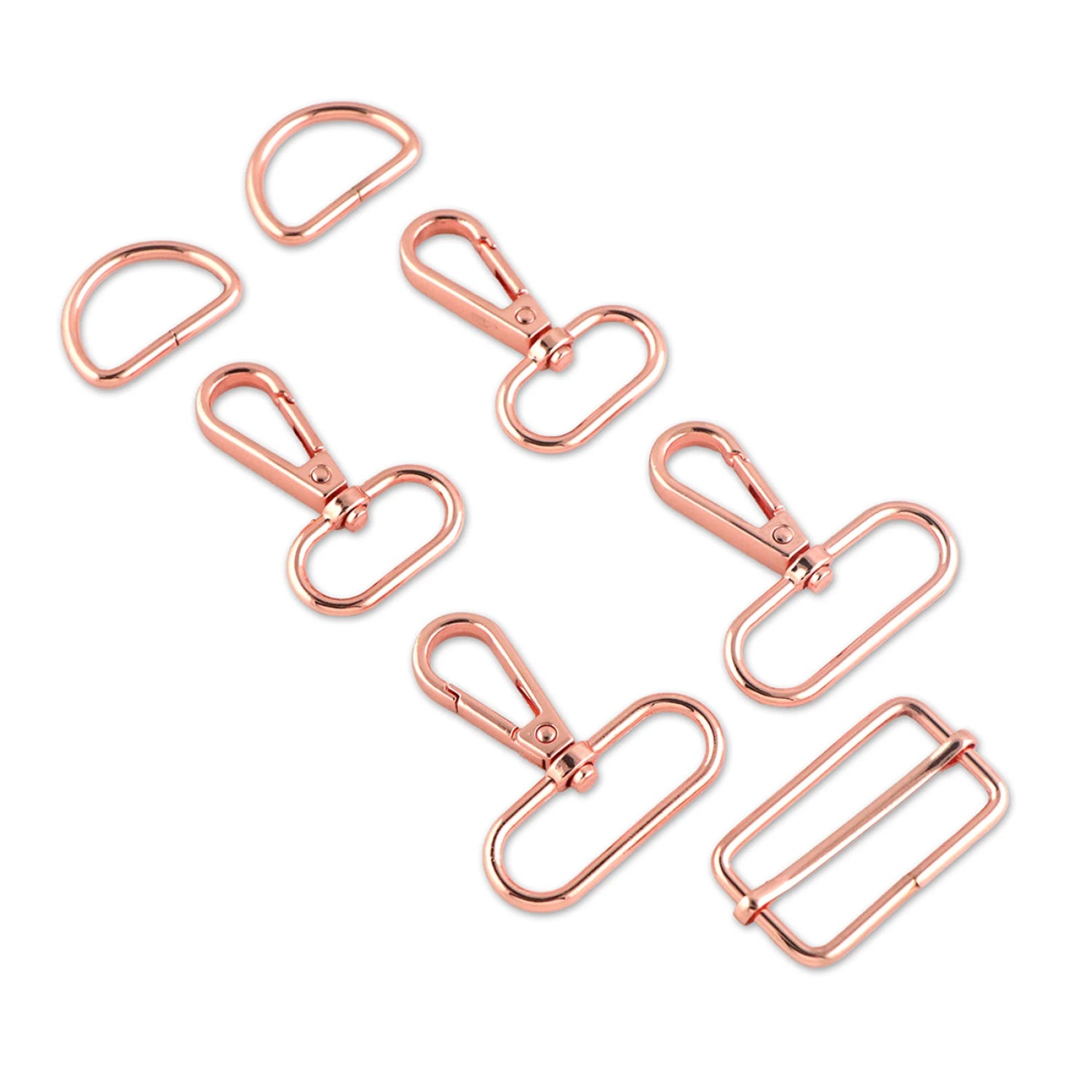 Set of rose gold bag hardware on a white background
