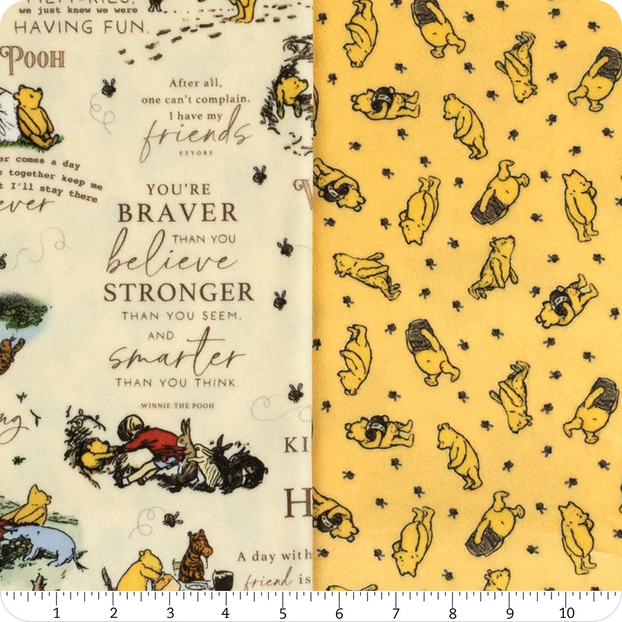 Swatches featuring Pooh designs with text and illustrations - they show each side of the fabric with a ruler for scale.
