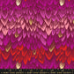 Fabric with pink and red dragon scale pattern, with accents of metallic gold scales and a ruler for scale.