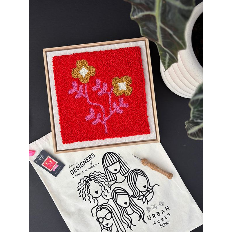 Red, yellow, and pink floral punch needle kit.