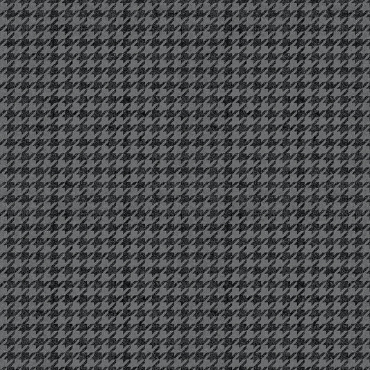 A black and gray tonal hounds tooth fabric.